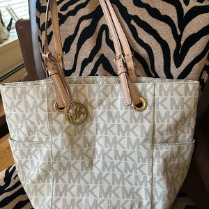 Michael Kors beige medium size tote used in excellent condition PRICED TO SELL